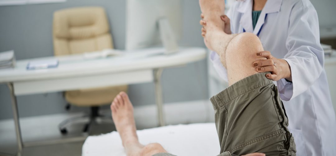 Senior patient undergoing rehabilitation therapy in hospital